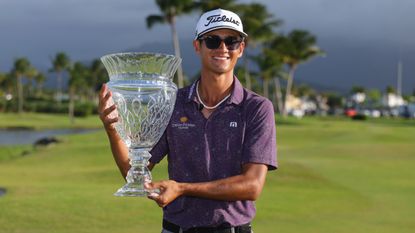 Ricky Castillo with the Puerto Rico Open trophy 