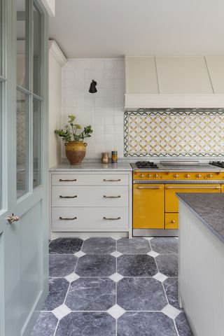 Rustic kitchen with pattern tiled splashback