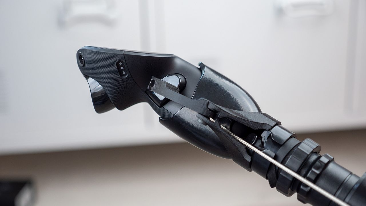 HelloReal putter accessory for Meta Quest controllers