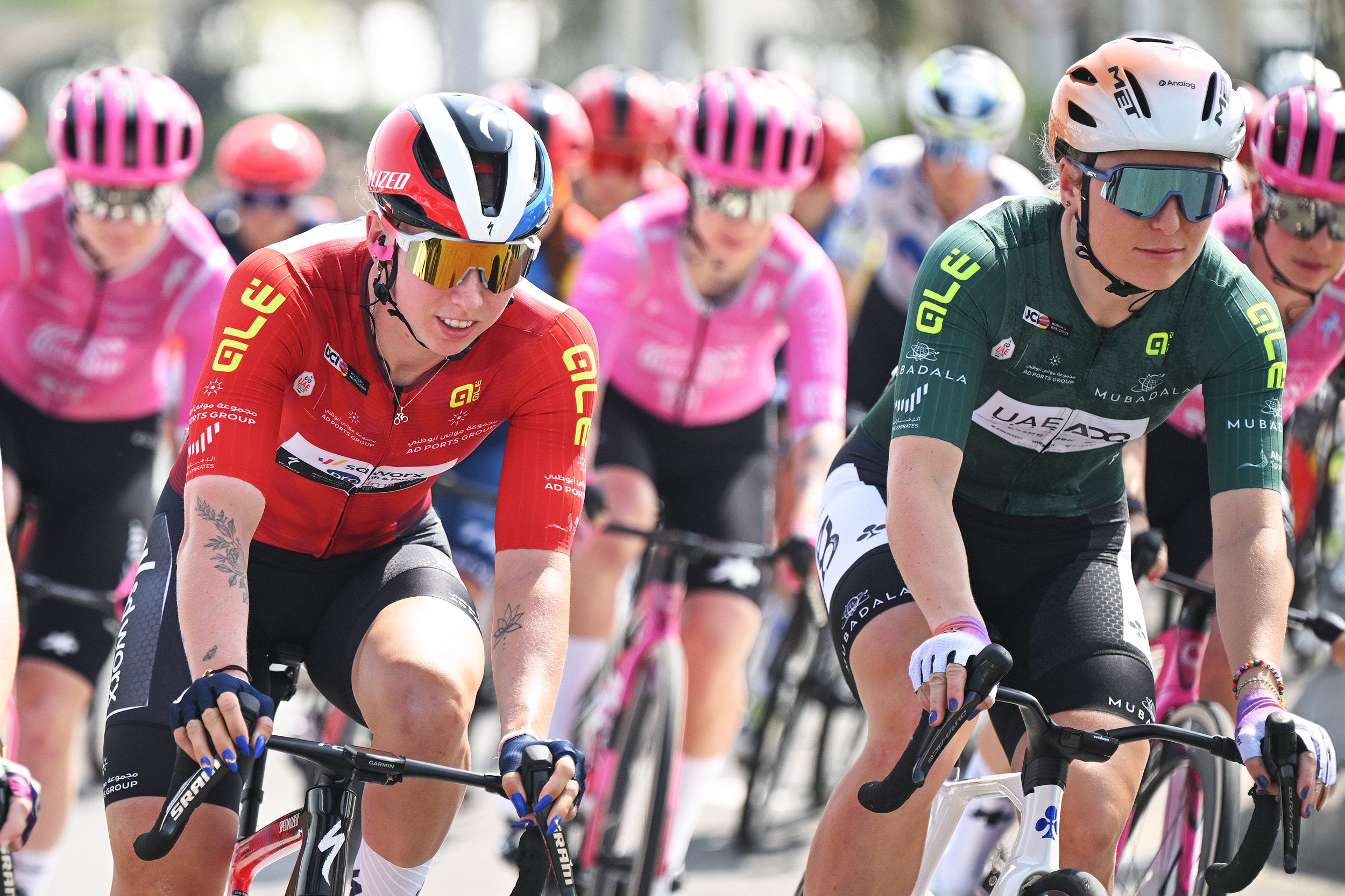 Lorena Wiebes and Lara Gillespie race alongside each other in the peloton on stage 3 of the 2026 UAE Tour Women