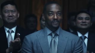 Sam Wilson (Anthony Mackie) sits in on an event in Captain America: Brave New World