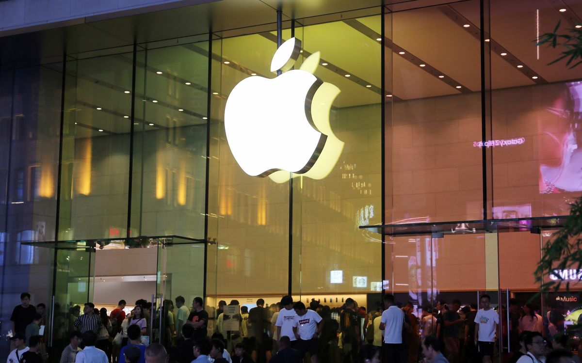 Apple logo displayed on a store front in Shanghai, China. 