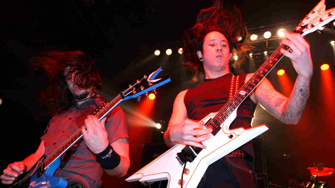 Trivium performing onstage in 2006