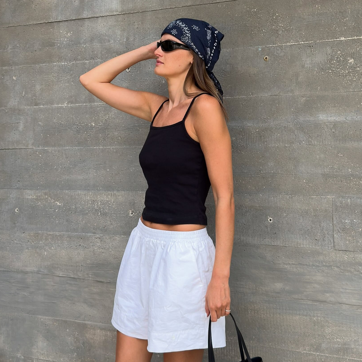 Influencer wearing heat-wave proof summer outfit.