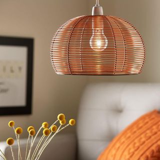 living room with copper domed pendant shade