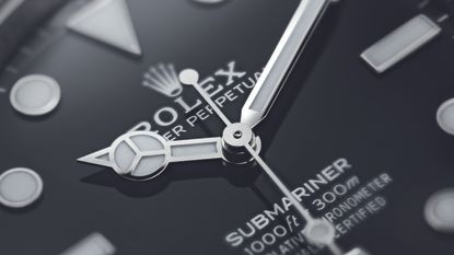 Close up image of a Rolex Submariner dial – one of the best dive watches available to buy