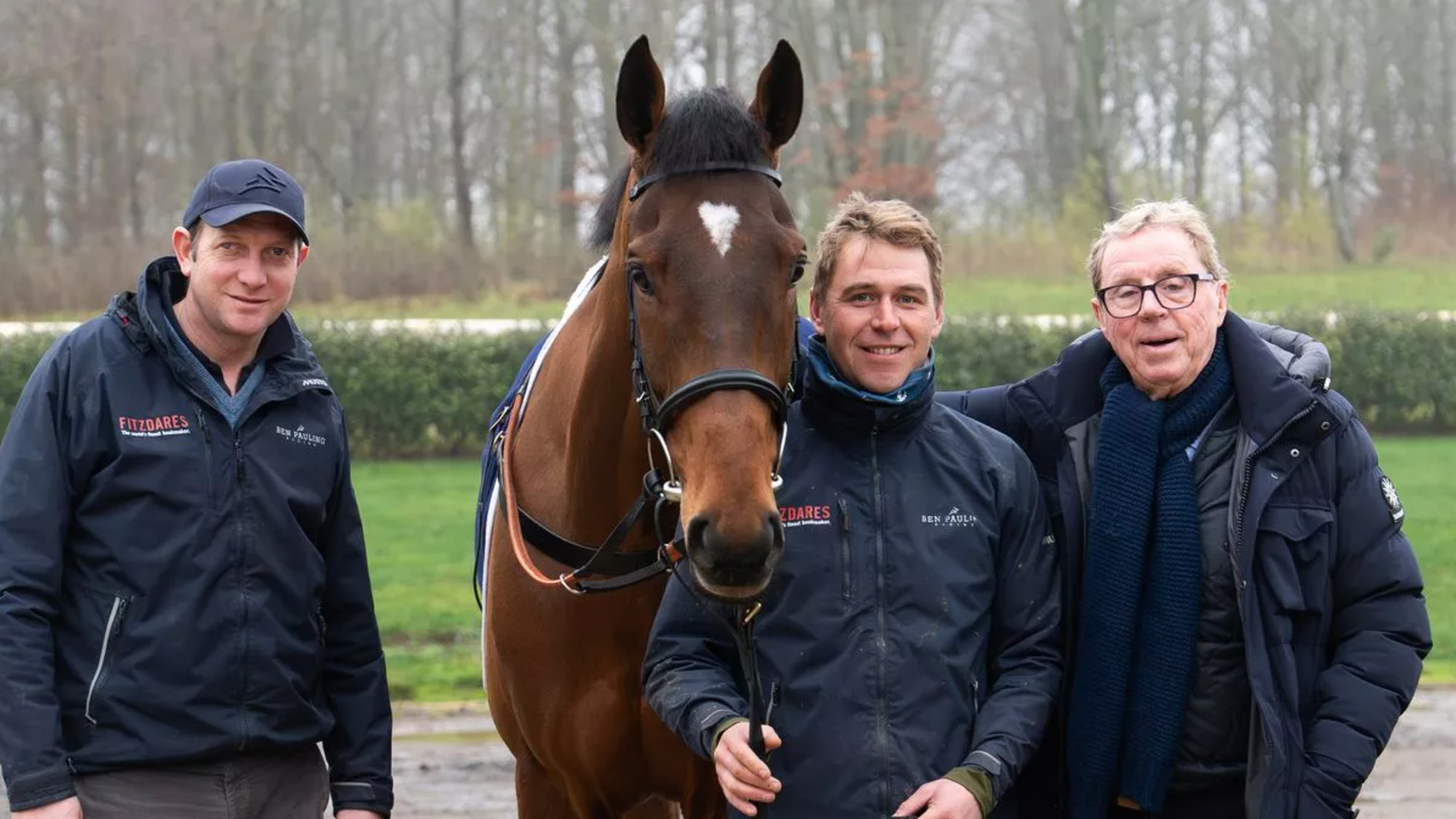 Trainer Ben Pauling, work rider Ollie Wardle and owner Harry Redknapp with King George VI Chase winner The Jukebox Man.