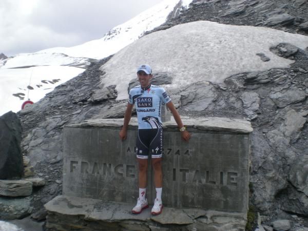 Contador at the border between France and Italy at the top of the colle dell'Agnello