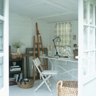 log cabin studio with white walls