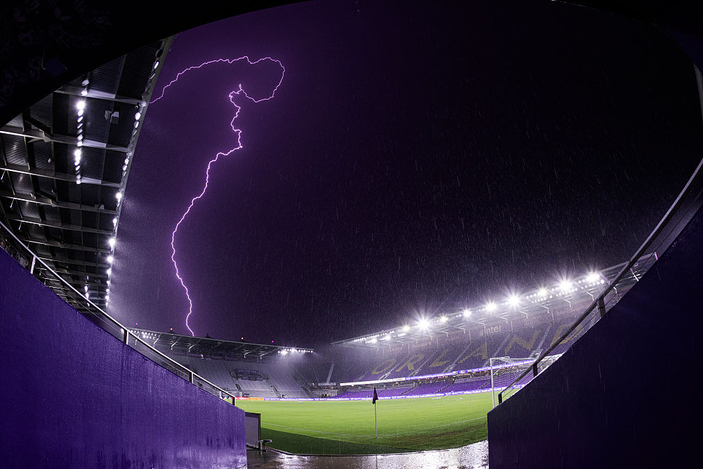 General view inside the stadium as a lightning strikes the MLS match between Orlando City and Sporting Kansas City at Inter&amp;amp;Co Stadium on August 16, 2025 in Orlando, Florida
