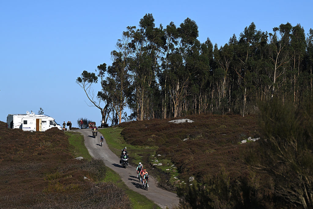 FOIA, PORTUGAL - FEBRUARY 19: Paul Seixas of France and Team Decathlon CMA CGM, Juan Ayuso of Spain and Team Lidl - Trek, Oscar Onley of Great Britain and Team INEOS Grenadiers and Joao Almeida of Portugal and UAE Team Emirates - XRG compete in the breakaway during the 52nd Volta ao Algarve em Bicicleta 2026, Stage 2 a 183.5km stage from Portimao to Foia (Monchique) 882m on February 19, 2026 in Foia, Portugal. (Photo by Dario Belingheri/Getty Images)