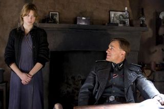 Inglourious Basterds - Christoph Waltzâ€™s SS Colonel interrogates a family of French farmers in Quentin Tarantinoâ€™s genre-sprawling World War Two action movie