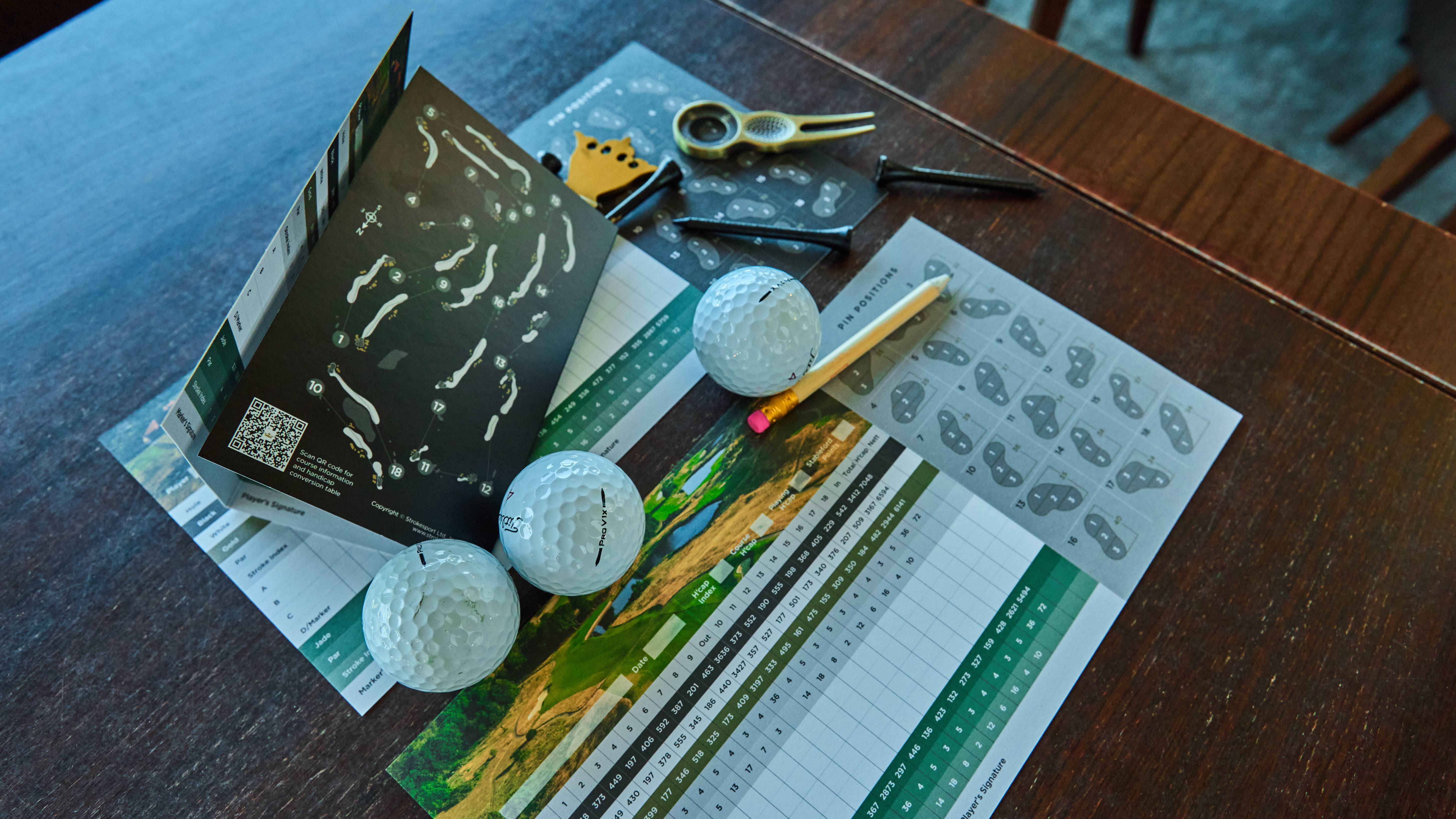 Golf scorecard and golf balls