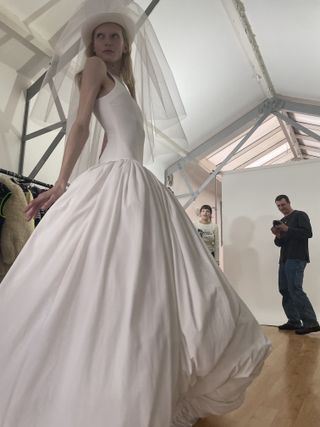 Model in wedding dress by Conner Ives