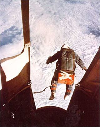 Air Force Captain Joseph Kittinger, Jr. jumps from Excelsior III balloon gondola in 1960 test, freefalling toward Earth for over 4 minutes.
