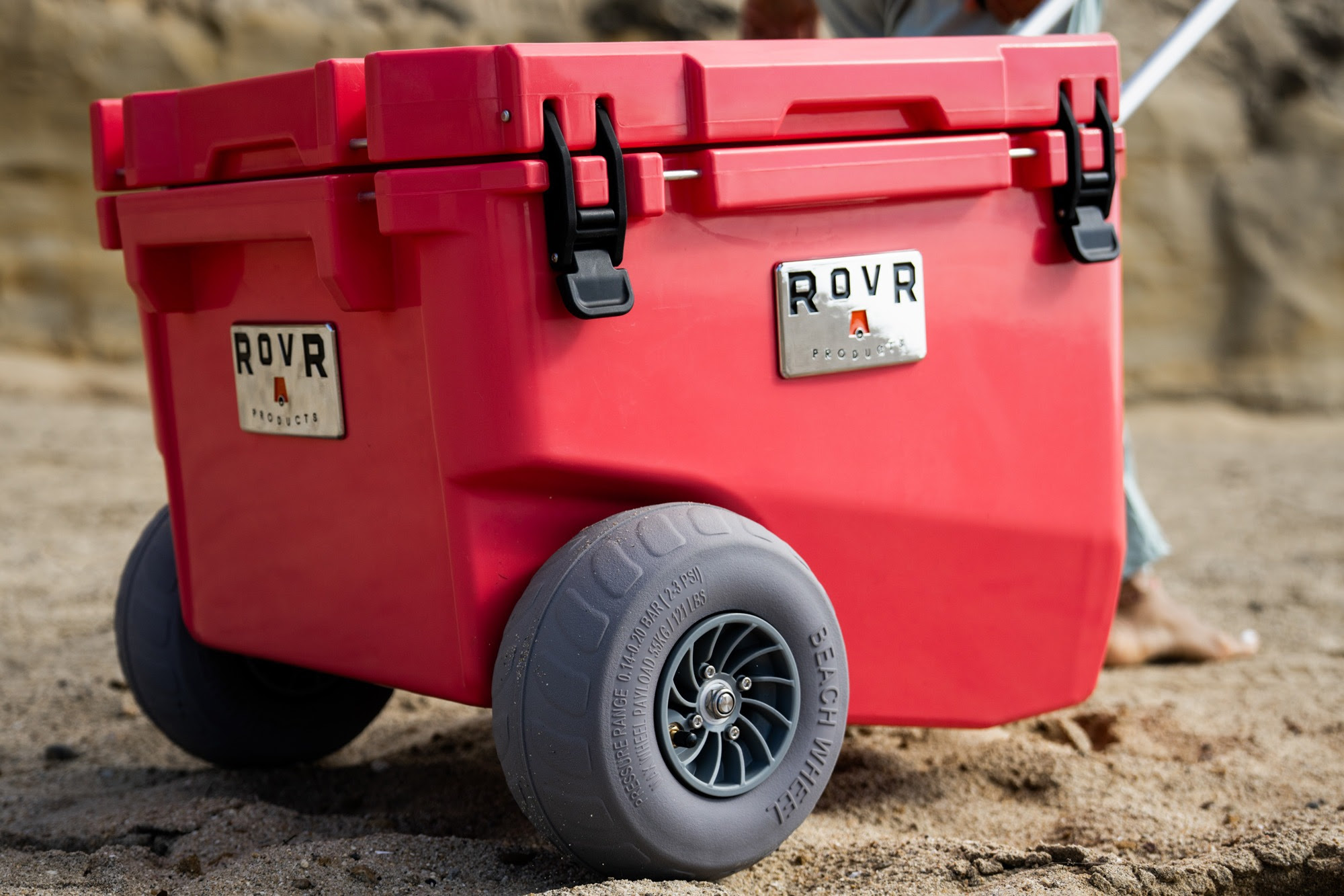 A red Rovr RollR 30 wheeled cooler