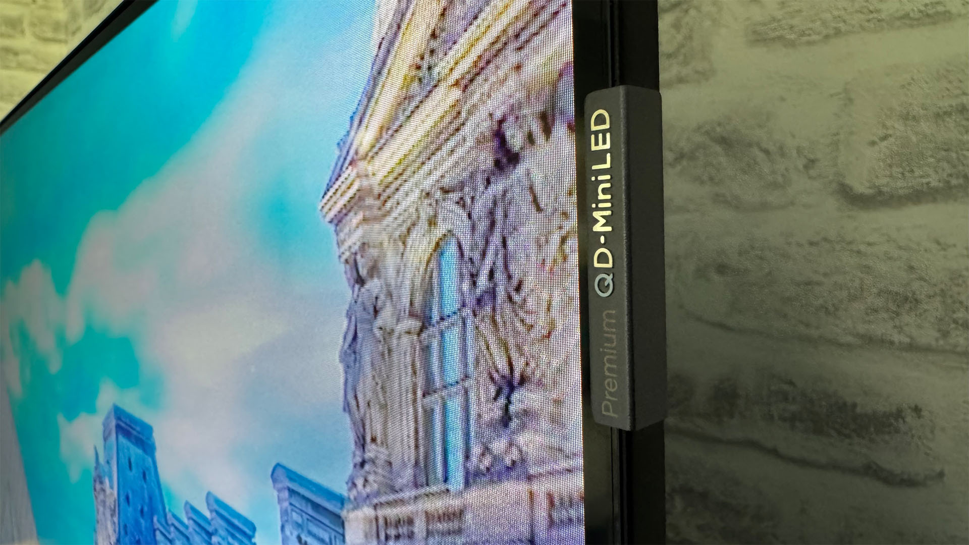 TCL C6KS 50-inch TV edge of set showing QD-Mini LED and ancient temple on screen
