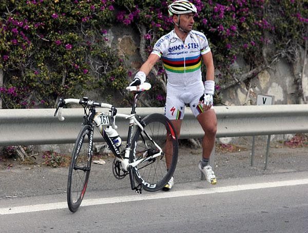 Paolo Bettini (QuickStep) picks himself up after a fall on the Cipressa.