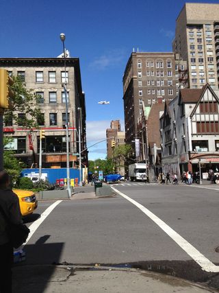 Reader Kendra Snyder caught the Enterprise between the buildings of Manhattan's Upper West Side at 80th and Broadway on April 27, 2012.