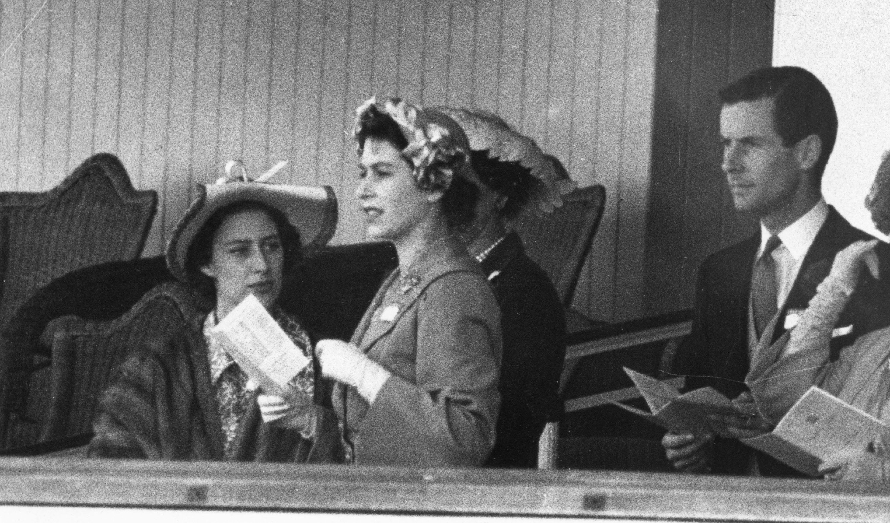 Princess Margaret, Queen Elizabeth and Group Captain Peter Townsend are pictured at Royal Ascot in 1952