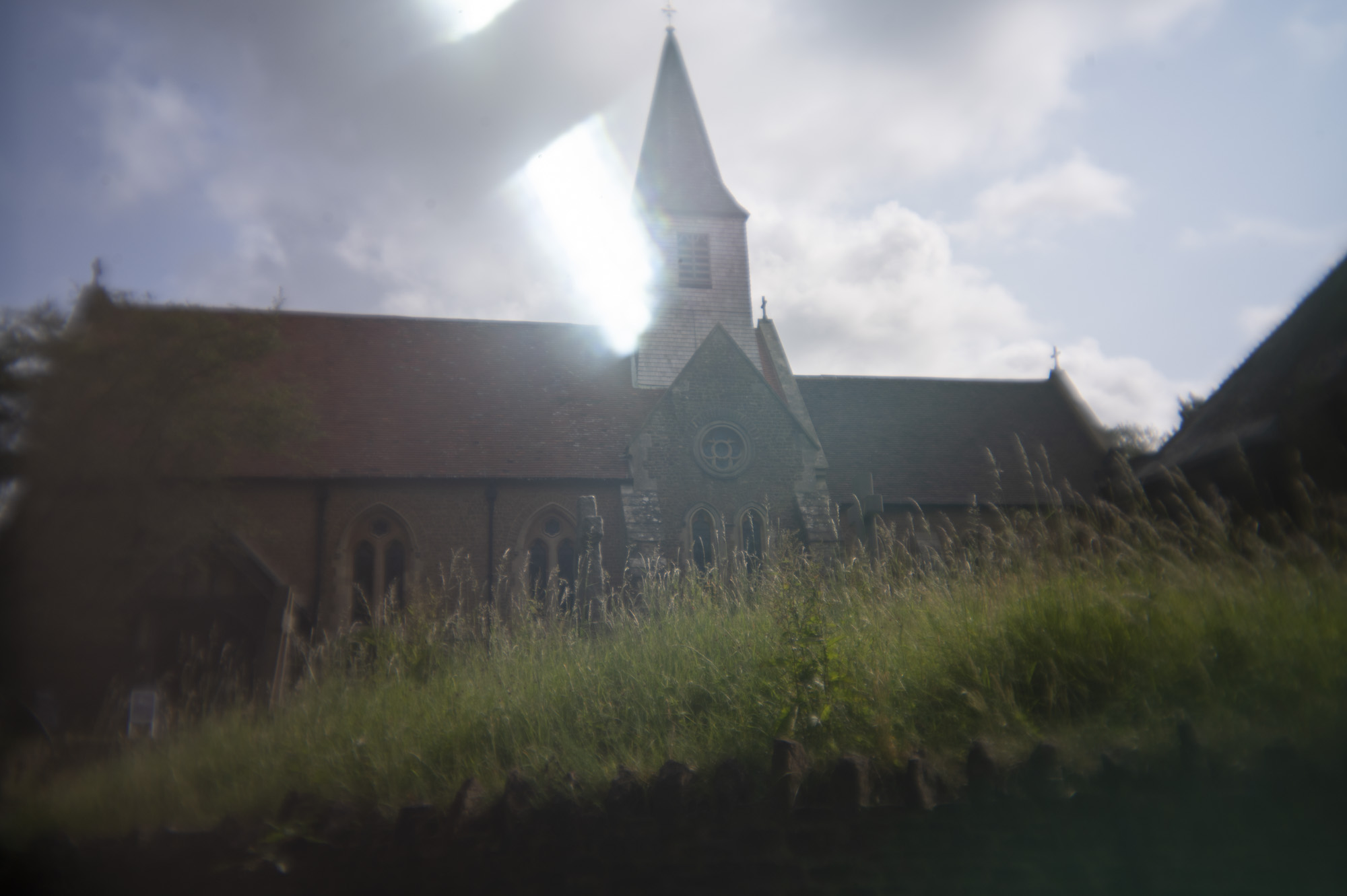 The exterior of an old Anglican church in the UK