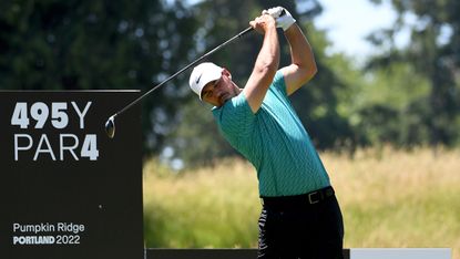 Brooks Koepka takes a shot in a practice round before the Portland LIV Golf Invitational Series event