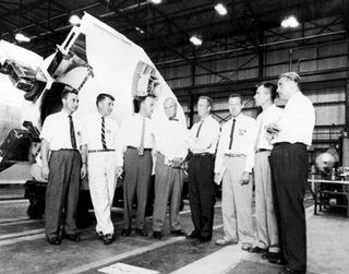 Dr. Von Braun, right, worked directly with America's first seven astronauts. This photo is believed to have been taken about 1959 in the Fabrication Laboratory of the Army Ballistic Missile Agency in Huntsville. The astronauts are, from left, Gus Grissom, Wally Schirra, Alan Shepard, John Glenn, Scott Carpenter, Gordon Cooper, and Deke Slayton.