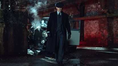 Cillian Murphy as Tommy Shelby walking in Peaky Blinders: The Immortal Man