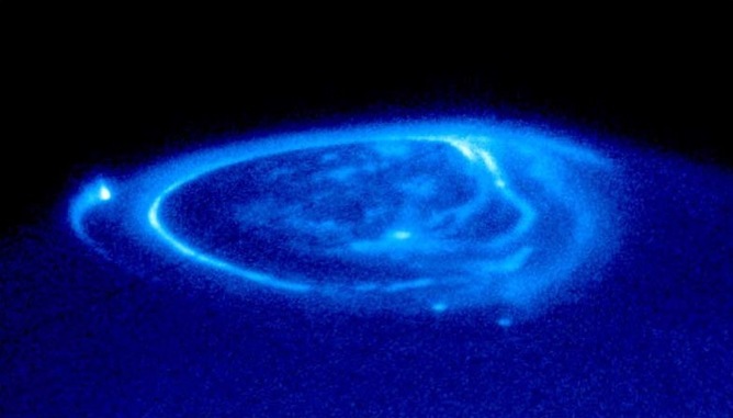 Jupiter's Moons Spin Intricate Auroras at Planet's Poles