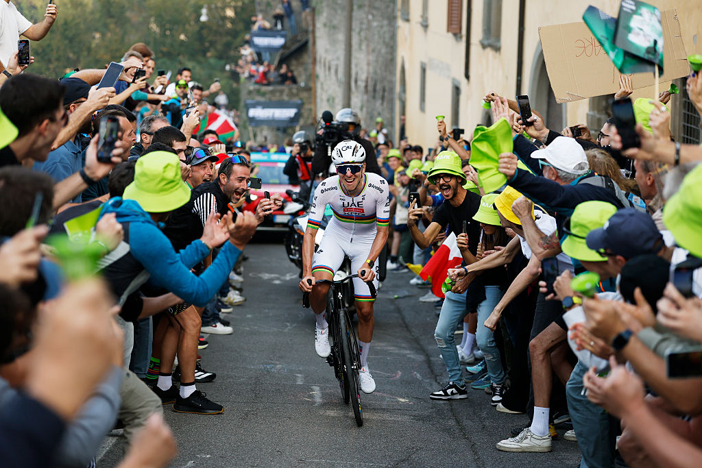 BERGAMO, ITALY - OCTOBER 11: Tadej Pogacar of Slovenia and Team UAE Team Emirates competes in the breakaway while fans cheers during the 119th Il Lombardia 2025 a 241km one day race from Como to Bergamo on October 11, 2025 in Bergamo, Italy. (Photo by Luca Bettini - Pool/Getty Images)