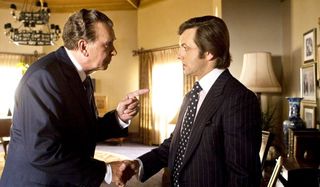 Frost / Nixon Frank Langella Michael Sheen in a forceful handshake