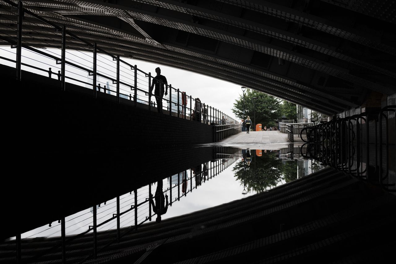 Sony RX1R III sample gallery: flooded sidewalk under a bridge, reflected