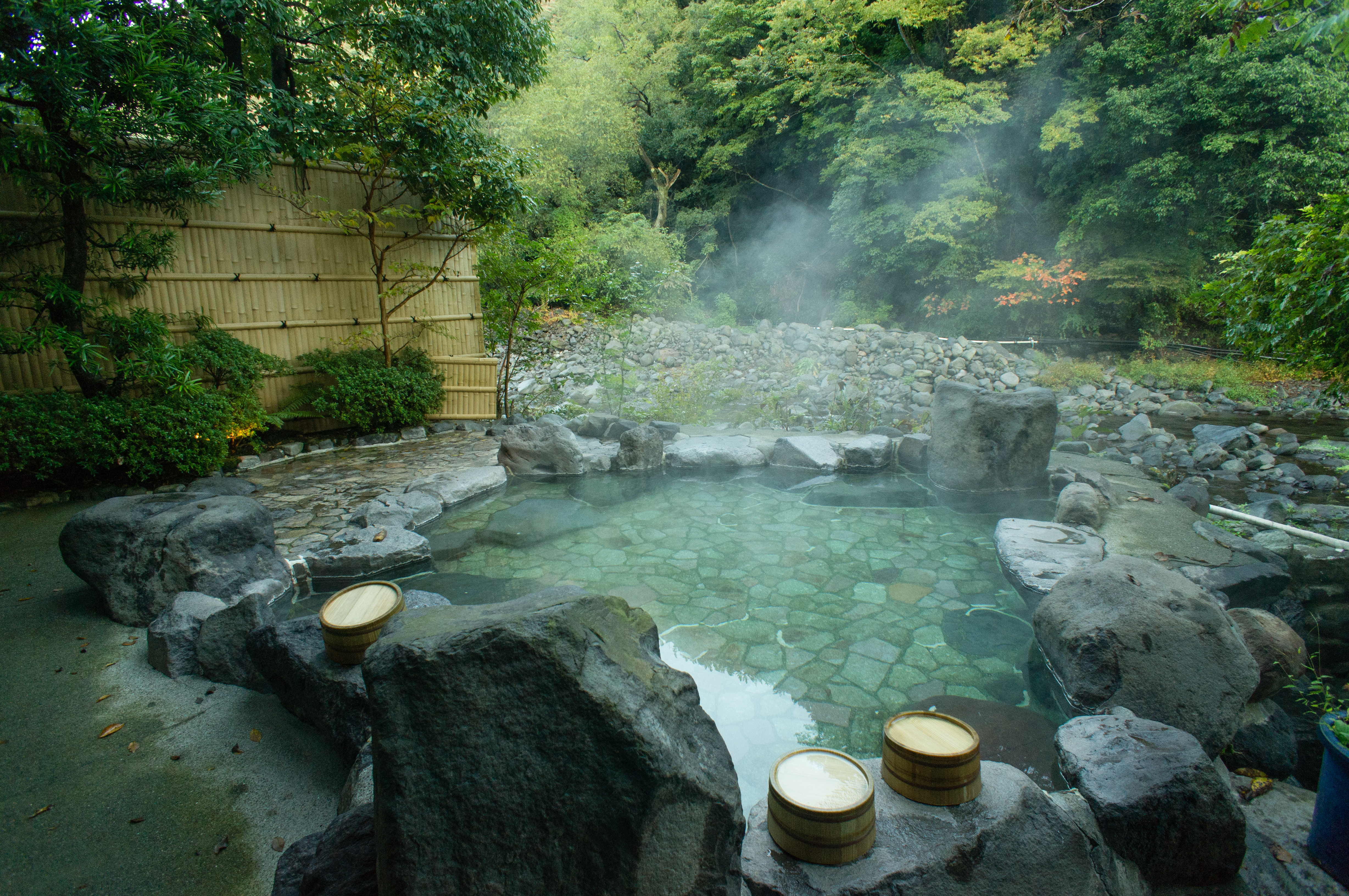 An outdoor hot spring onsen bath in Hakone, Japan