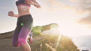 Woman running wearing leggings