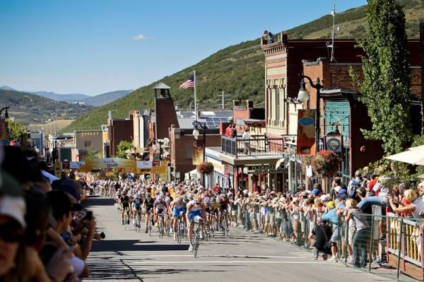 Riders leave the line on Main Street.