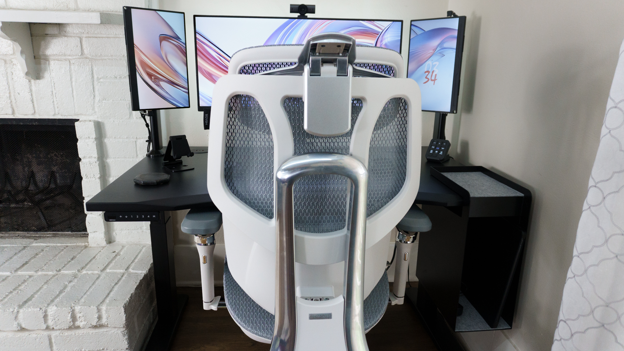 The Hbada X7 pushed into a desk