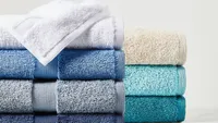 Pile of John Lewis & Partners Egyptian Cotton Towels