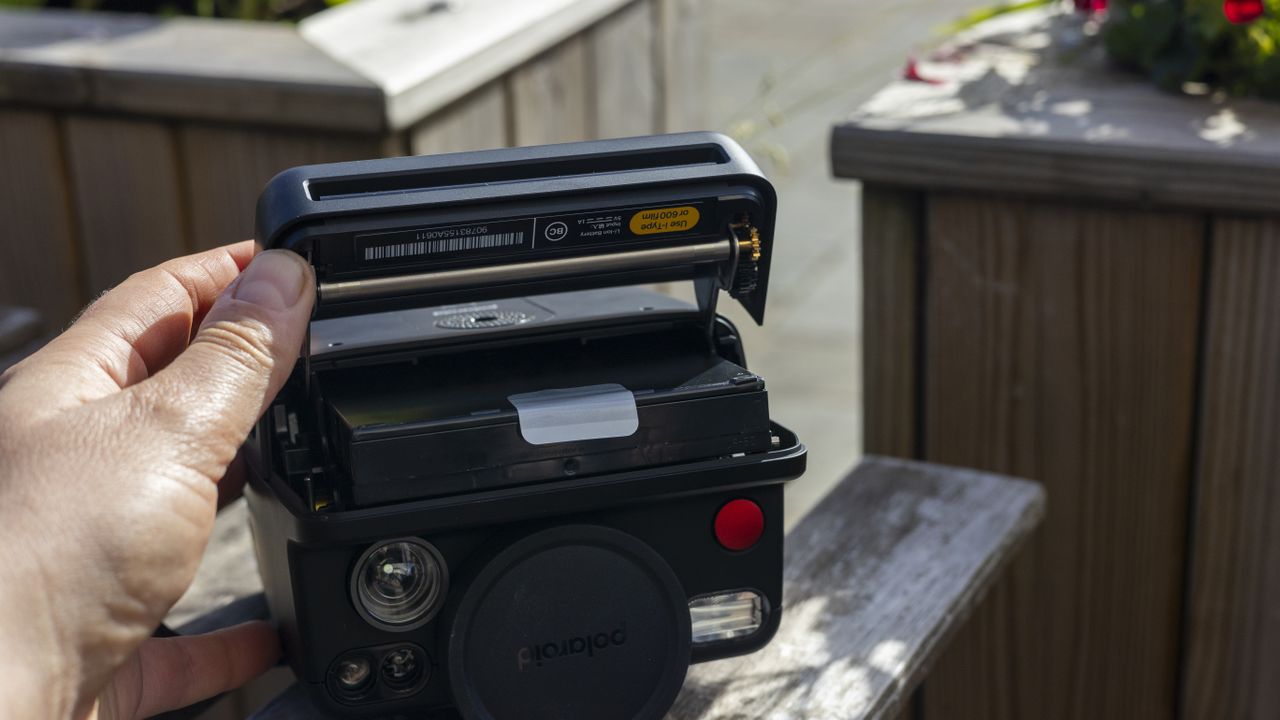 The Polaroid I-2 being loaded with film