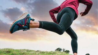 Woman running wearing Columbia Escape Pursuit shoes