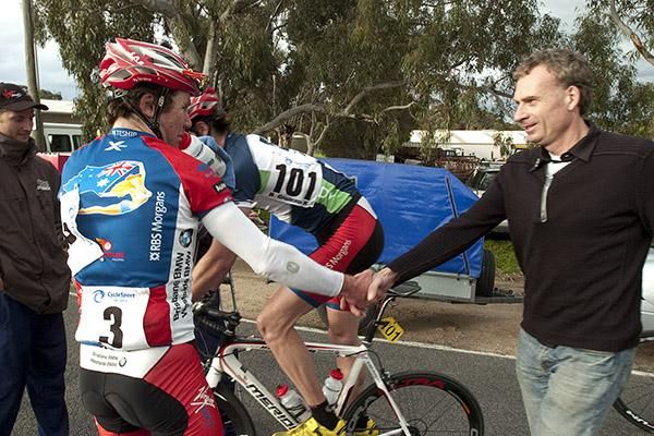 Stage winner Cameron Peterson is congratulated by his Virgin Blue/RBS Morgans team-manager Patrick Jonker.