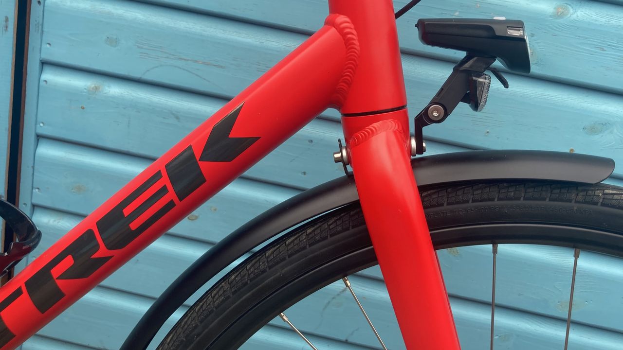 A side on view of the fenders and headlight that come with the Trek FX 2 Disc Equipped