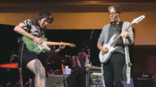Yvette Young and Steve Vai on stage