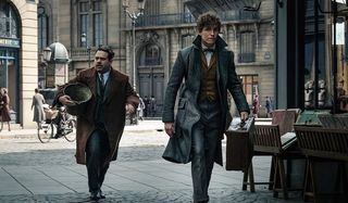Fantastic Beasts: The Crimes of Grindelwald Jacob and Newt cautiously walk down the street