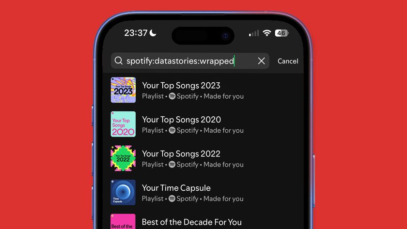 An iPhone showing the Spotify app&#039;s search bar being used to search for Spotify Wrapped 2024.