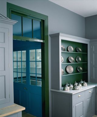 gray on gray kitchen with pops of green and blue