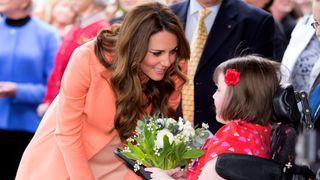 Kate Middleton with a young fan