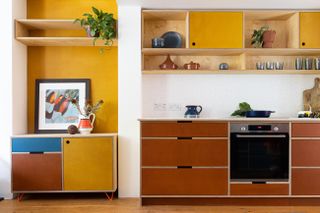 red and yellow plywood kitchen fronts and shelving