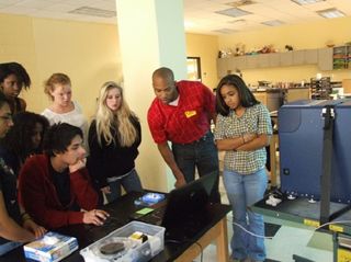 Baratunde Cola works with local high school kids at Georgia Institute of Technology