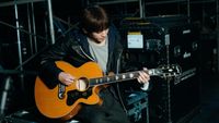 Lee Seung Yoon with his signature guitar