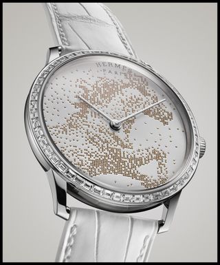 An image of the Hermès Slim d’Hermès Cheval de Légende with silver face and face detailing